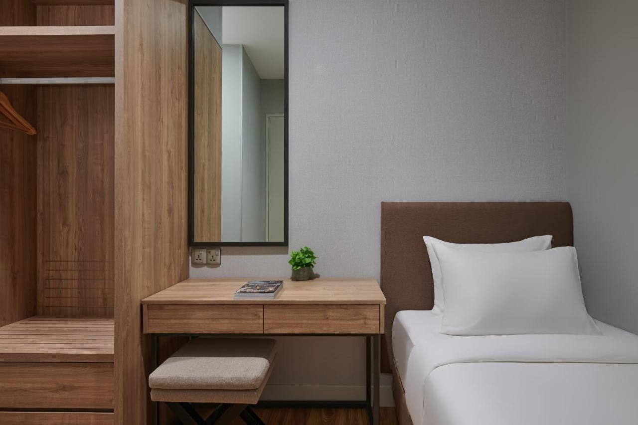 Mercure Living Putrajaya Ngoại thất bức ảnh A bedroom at the hotel
