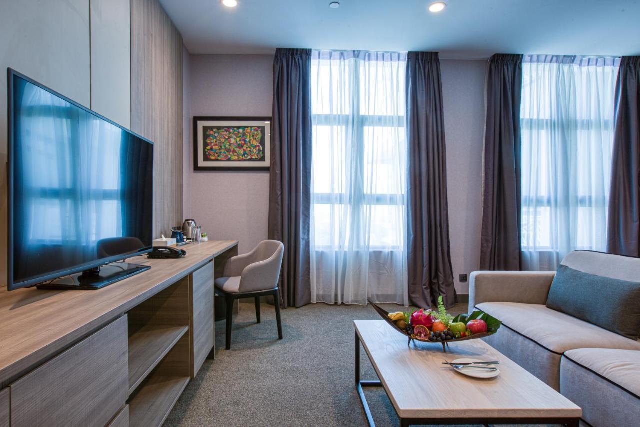 Mercure Living Putrajaya Ngoại thất bức ảnh A living room in a serviced apartment in Moscow, Russia