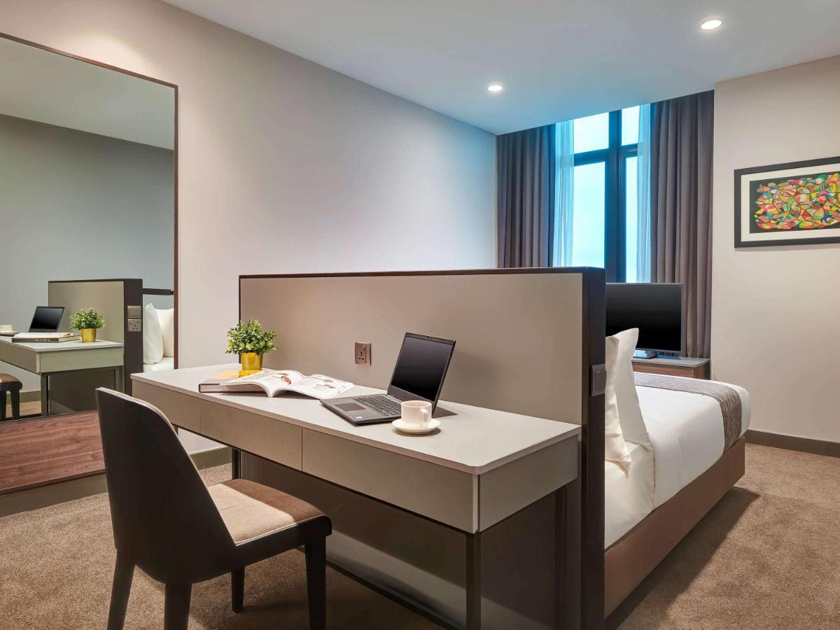 Mercure Living Putrajaya Ngoại thất bức ảnh A bedroom at the hotel